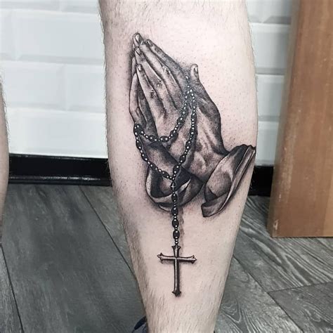 Opt for light-pressure ink for a delicate, understated look that holds a strong spiritual message. . Hand jesus tattoo design